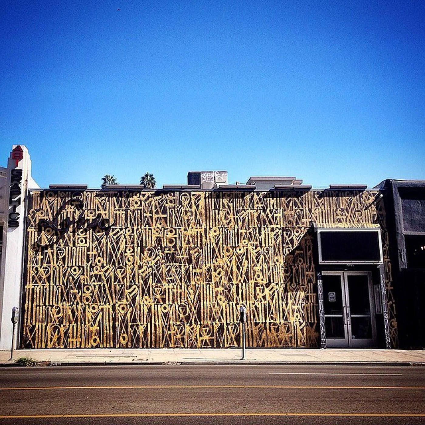 RETNA gold calligraphic installation at MOCA Los Angeles